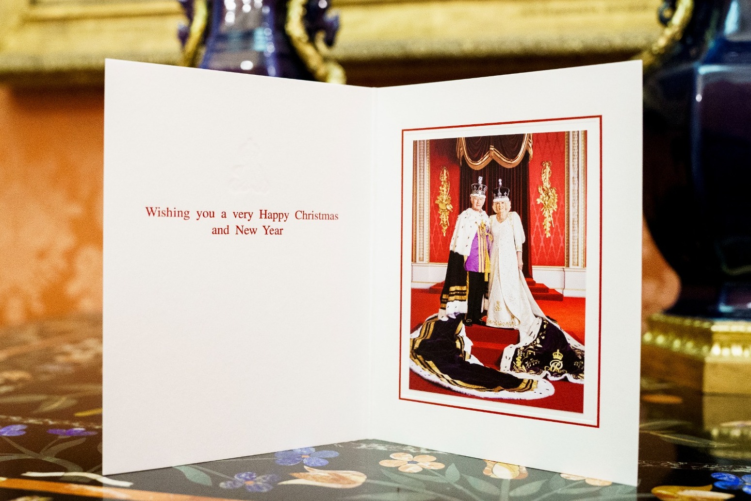 King chooses coronation Christmas card but family photo for William and Kate 