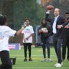 William shows off unbelievable arm playing American football with youngsters