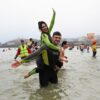 Romantic proposal makes waves at Tenby Boxing Day swim